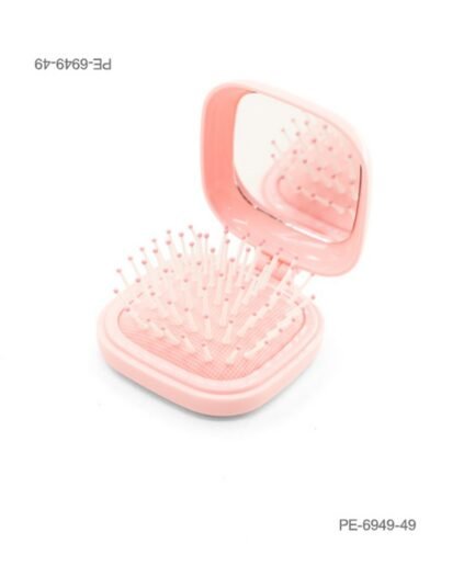 Cepillo de cabello plegable de bolsillo con espejo integrado y cerdas con puntas rosadas, en carcasa cuadrada de color rosa claro o salmón PE6949